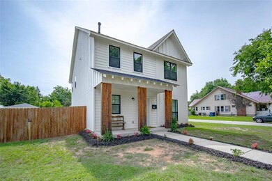 Modern farmhouse featuring a porch and board and batten siding