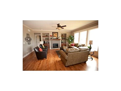 Living Room with Maple Floors and Gas Fireplace