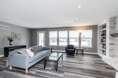 Light & bright family room aided by a multitude of