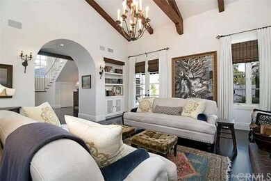 French doors lead out to beautifully landscaped co