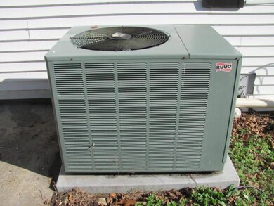 The central heat and air unit is a RUDD. Ductwork is conveniently installed in an expansion room upstairs. 