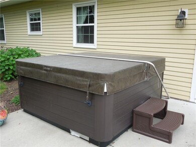 Enjoy relaxing in the hot tub just off the family 