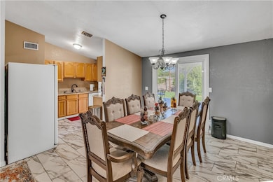 Dining room into kitchen and out to rear yard.