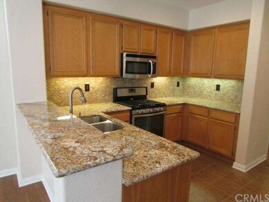 Remodeled Kitchen with gorgeous granite counter to