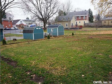 Yard. This is a fully-fenced triple lot. It is rar