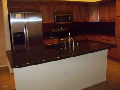 Kitchen with Microwave and Refrigerator