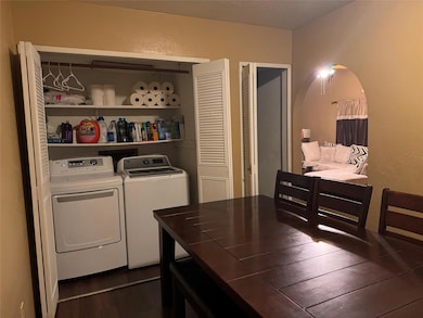 Clothes washing area with washer and clothes dryer