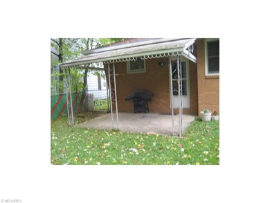 Patio in rear fenced yard.