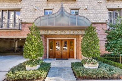 Main Entrance with Gated Garage on the Left