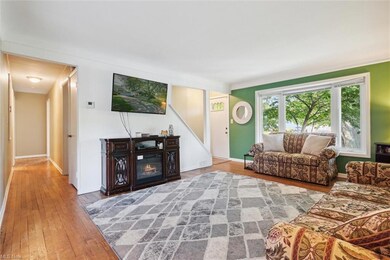 Living room with light hardwood flooring