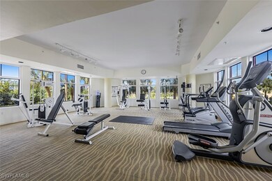 Exercise room with carpet, plenty of natural light