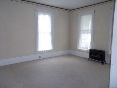 Living room with free standing gas fireplace