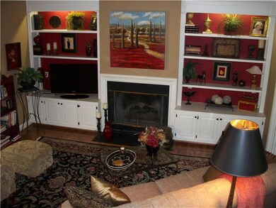 Relax & watch your favorite TV show in the family room or read a book as you glance out the french doors upon your patio oasis! During the winter, light the fireplace & enjoy the cozy peaceful atmosphere snuggled on your sofa! Notice the built-ins!