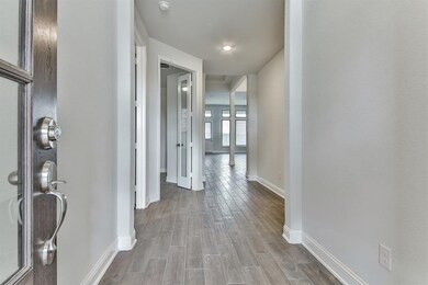 Enter to wood look tile throughout all living areas
