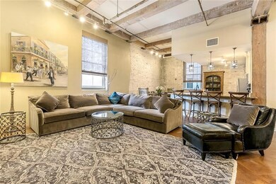 View of the den into the kitchen & dining area wit