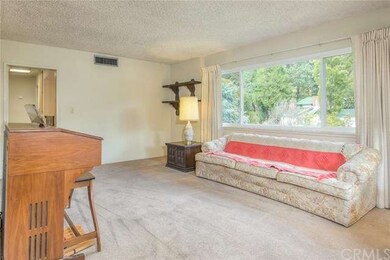 Living Room View Of Neighborhood