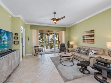 Living area featuring light tile patterned floorin