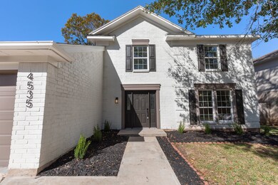 Charming two-story home. Features a spacious two-c