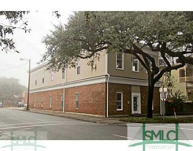 Brick home with convenient sidewalk for a walk.
