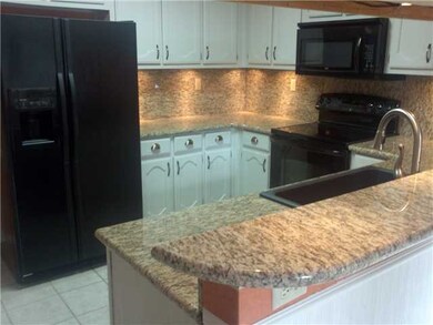 Look at this kitchen! New Granite counter top! Sta