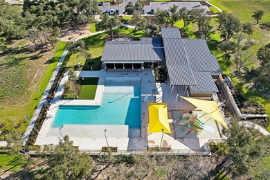 View from above of property featuring a pool