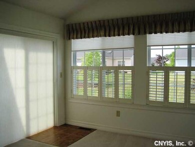 Other. Sunroom toward sliders to patio.
