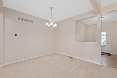 Formal Dining Room off of Large Entrance Foyer.