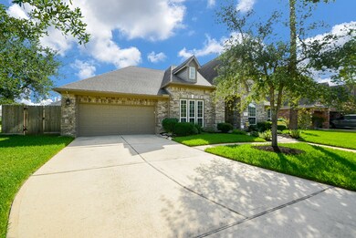 Front of the home with 3-car tandem garage