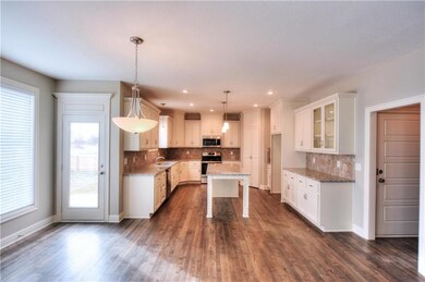 Stainless steel appliances and a walk in pantry