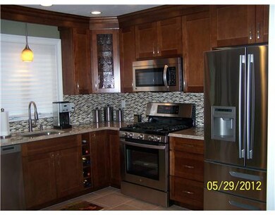 Kitchen. Gas Range, microwave and undercounter lig