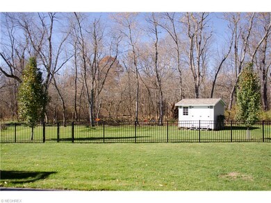 The fenced in back yard is perfect for kids or pets.