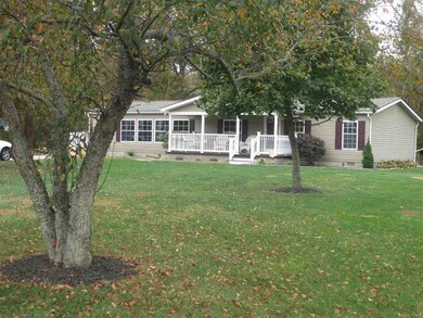 Large Front Yard With Trees.  Yard has perimeter d