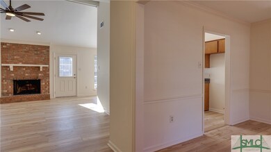 Foyer view into great room and dining area