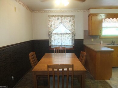 Dining room is open to the kitchen and living room