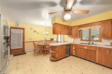 Spacious Kitchen with ample cabinets and counter s