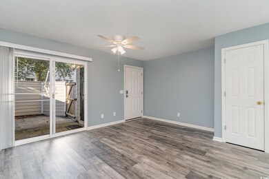 Unfurnished room with hardwood / wood-style floori