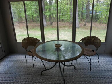 3 season sunroom off the kitchen....