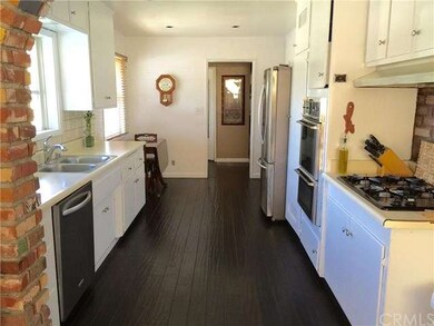 Alternate view of kitchen.
