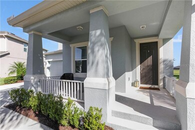 Cheerful, welcoming and spacious front porch.