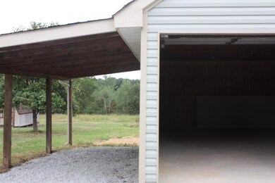 Large carport area attached to the garage