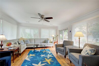 Bright and airy, this spacious sunroom addition gi