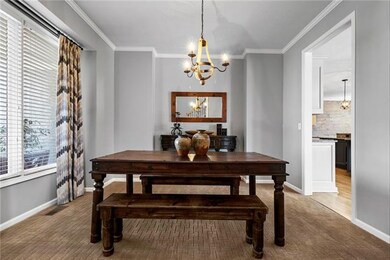 Formal dining w/ custom light fixture and inset fo