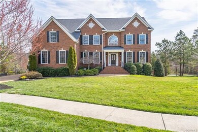 This 3 SIDES BRICK colonial is nestled on a half a
