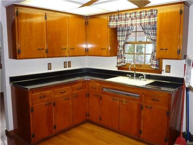 Kitchen. Hardwood floors, newly painted.