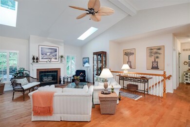 The Great Room's soaring vaulted ceiling includes 