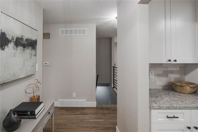 9007 E Floyd Place, Denver, CO 80231 - photo 2