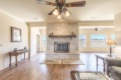 Wood burning fireplace in Living Room with hardwoo