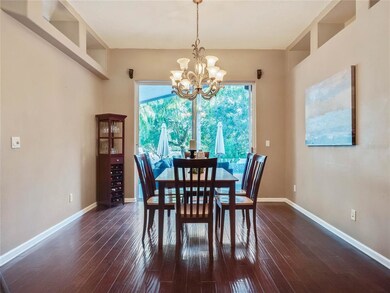 Living room/dining area with sliders to back patio