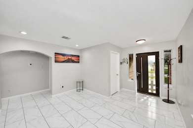 Another view of the formal living/dinning area