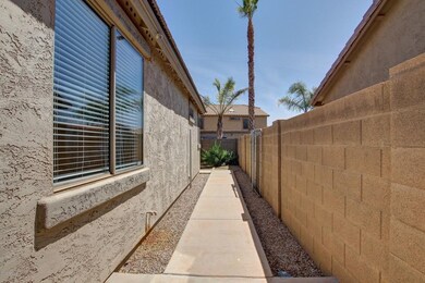 side yard and gate along W side
